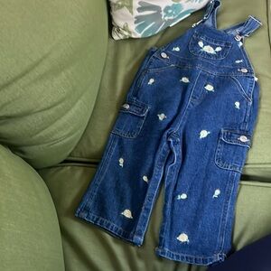 Denim overalls withh yellow and white flowers